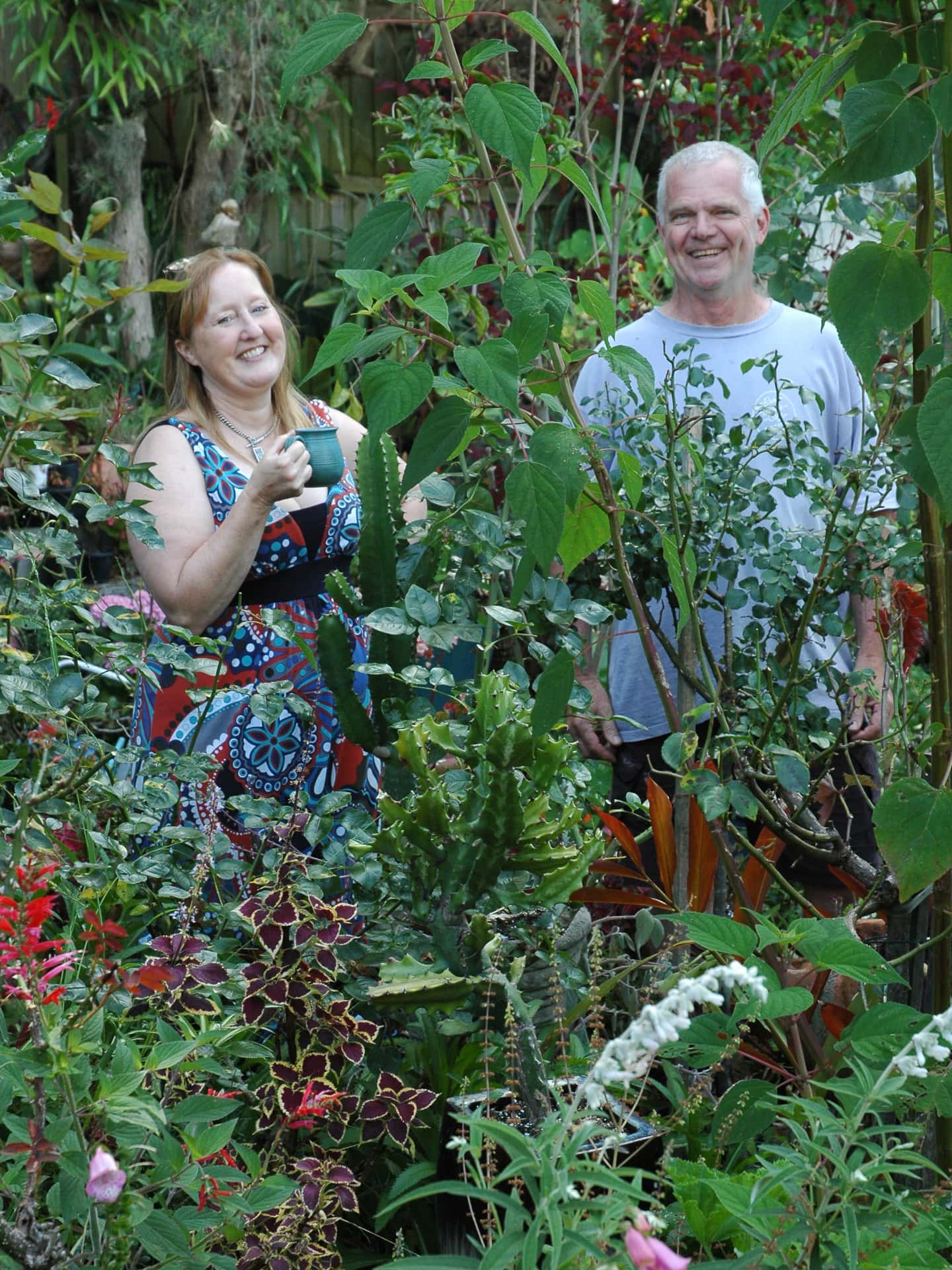 Belinda and Stephen Buck standing in their garden